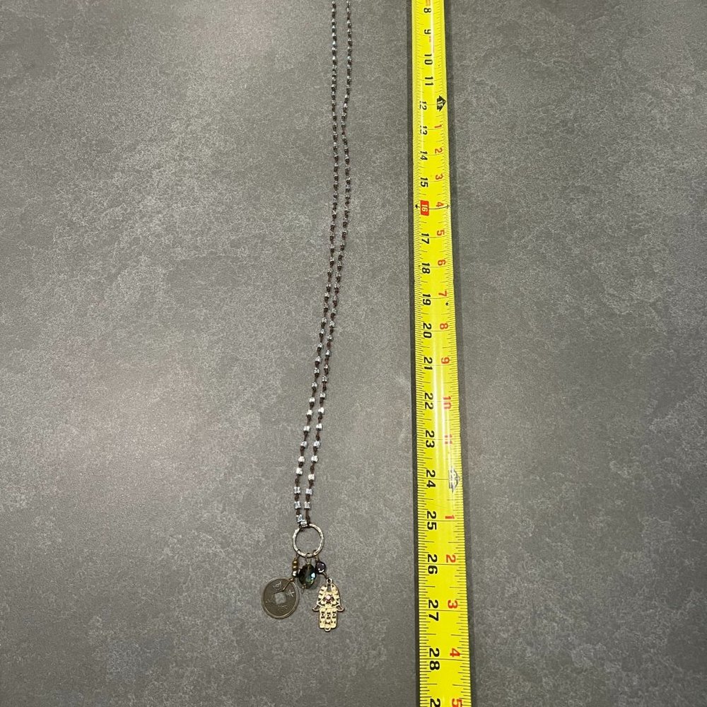 Beaded necklace with charms